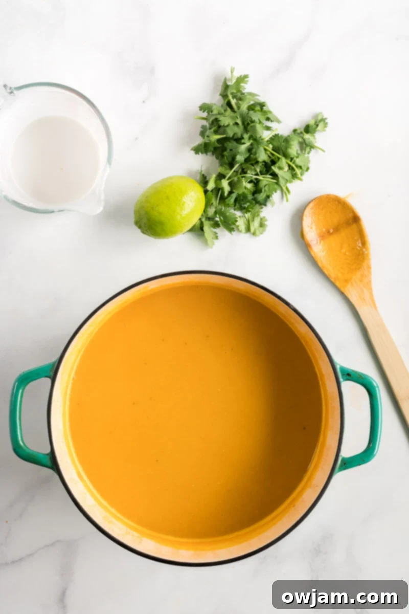 Golden Curry Butternut Squash Soup 7 Curried Butternut Squash Soup pureed in pot, looking creamy