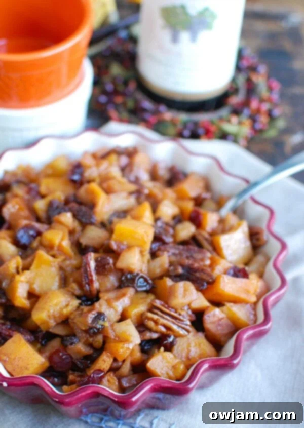 Butternut Squash Apple Bake in a festive baking dish, ready to be served as a holiday side.