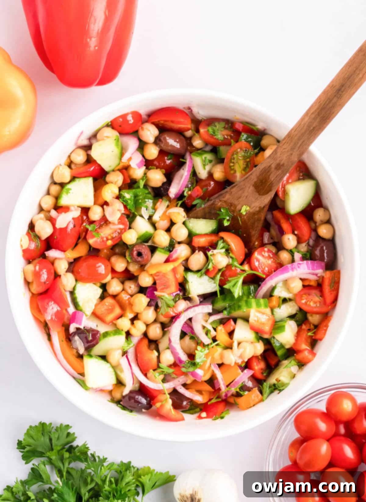 Vibrant Mediterranean Chickpea Medley 8 Mediterranean Chickpea Salad with spoon