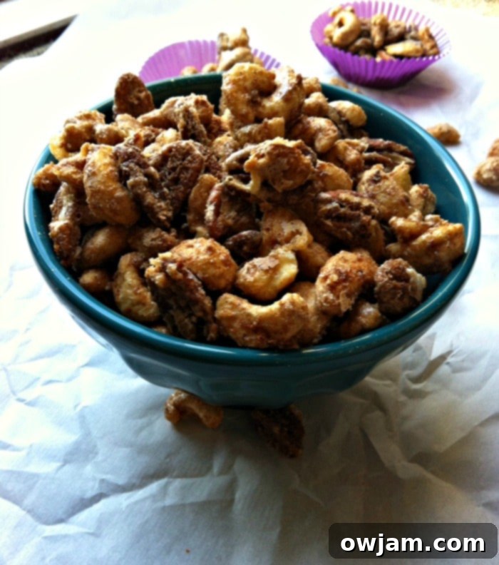 Sweet Heat Nut Medley 3 Sweet and Spicy Nut Mix in a bowl on a dark surface