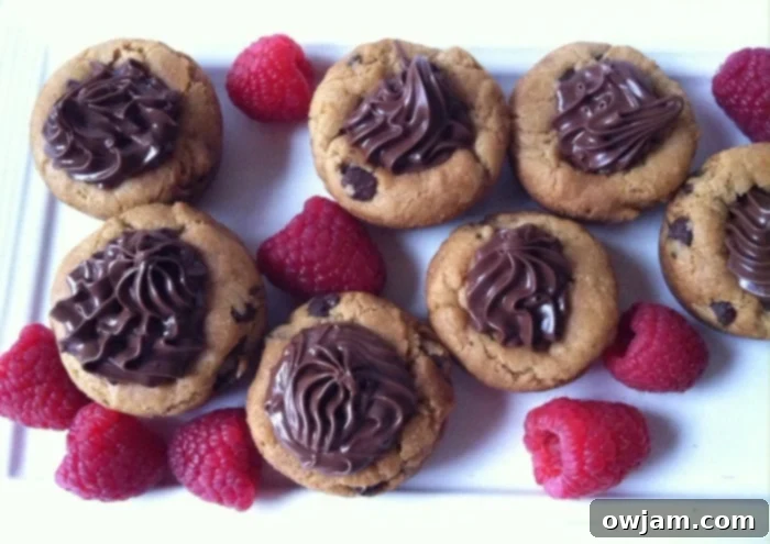 Tray of freshly baked Gluten-Free Nutella Chocolate Chip Cookie Cups ready to be served at a gathering