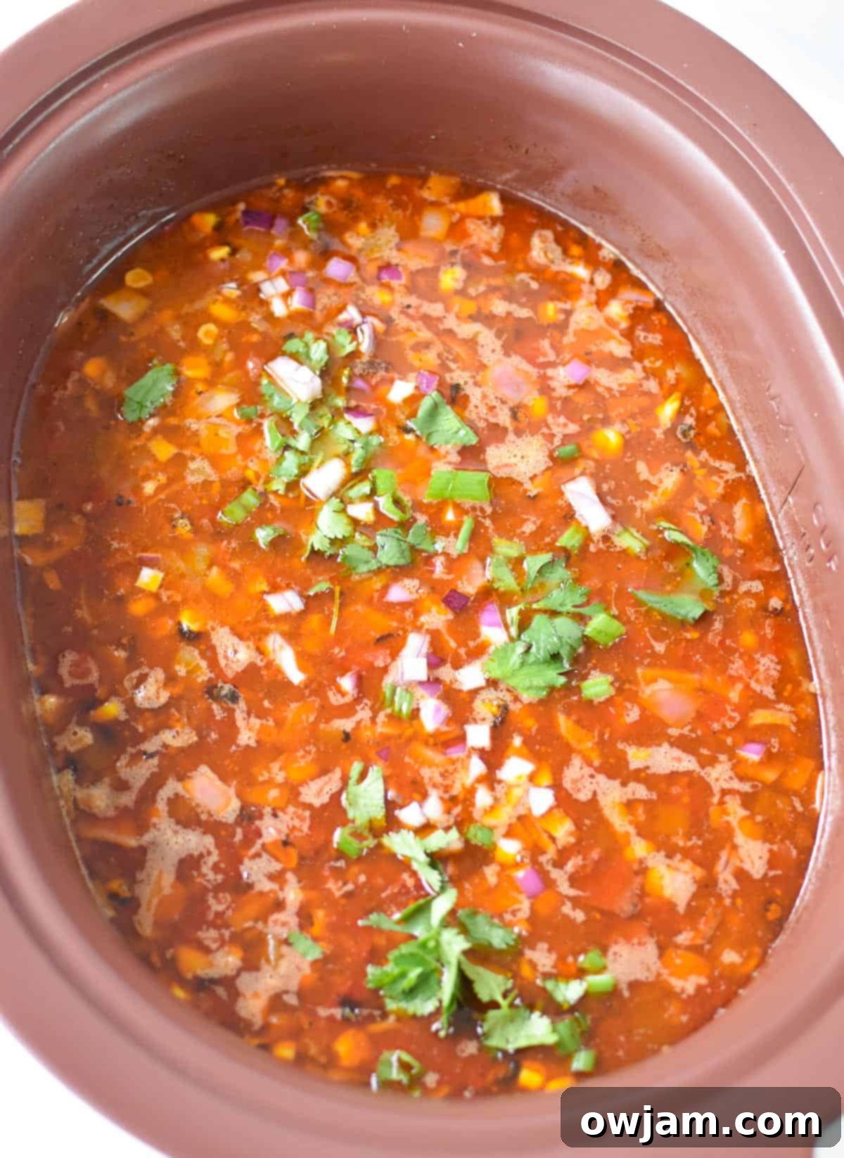 Slow Cooker Taco Soup Recipe simmering in a slow cooker