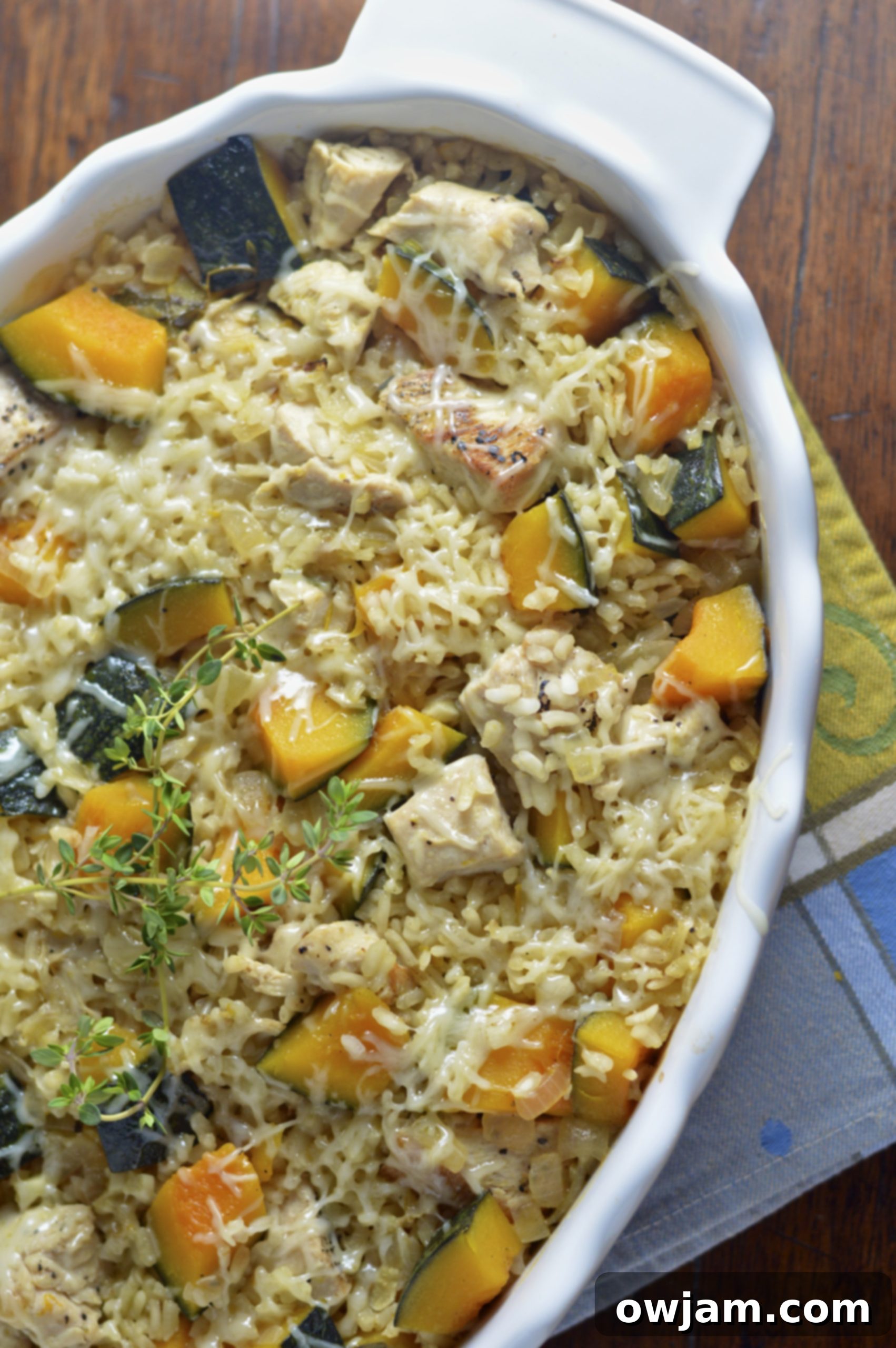 Kabocha Squash Chicken Risotto Bake 2 Baked Chicken Kabocha Squash Risotto Recipe in a white casserole dish.