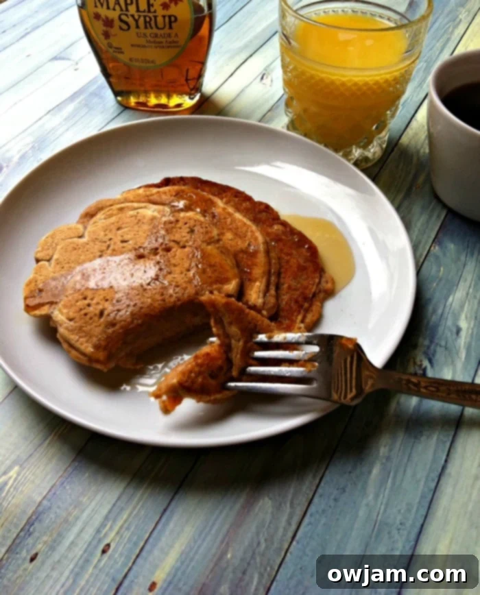 Stack of Sweet Cinnamon Potato Pancakes with berries