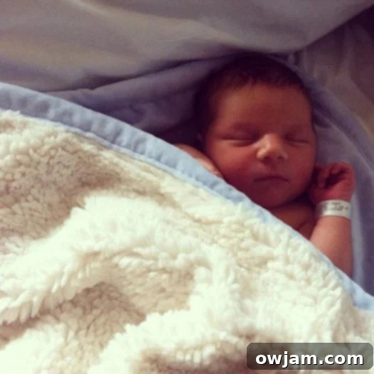 Close-up portrait of baby Andrew, awake and looking cute