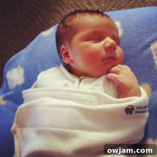 Sweet newborn Andrew, wide-eyed and curious