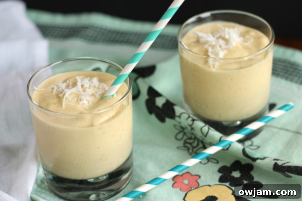 Fresh ingredients for Coconut Mango Smoothie, including sliced mango.