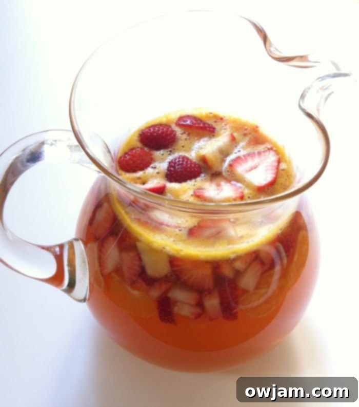 Glass of Homemade Strawberry Sangria with Fruit Garnish
