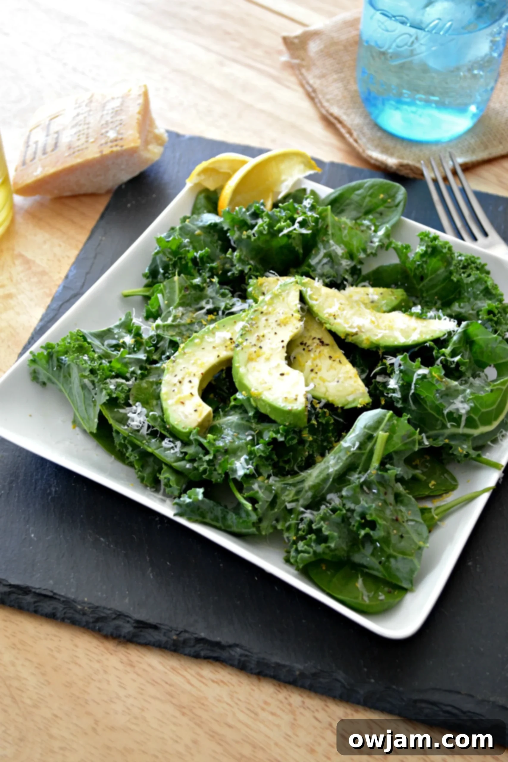 Green Goddess Power Salad 2 Vibrant Avocado Kale Spinach Salad with sliced avocado, ready to be served.