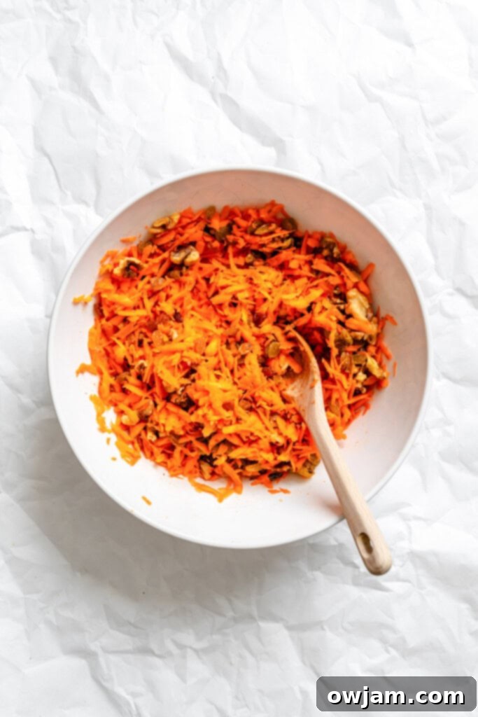 Golden Carrot Raisin Delight 7 Carrot Raisin Salad in a bowl