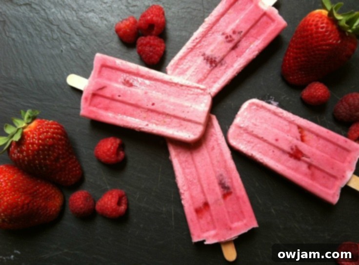 Creamy Berry Dream Pops 3 Close-up of Strawberry Raspberry Cream Pops with fresh fruit.