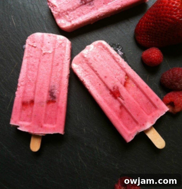 Creamy Berry Dream Pops 4 Popsicles in molds, ready for the freezer.