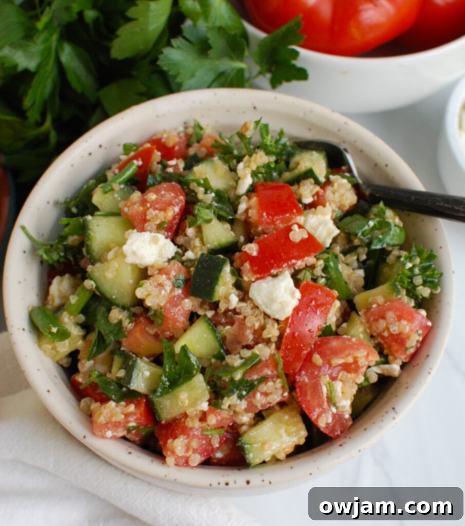 Bright Mediterranean Quinoa Salad 5 Small bowl of Tomato Cucumber Feta Quinoa Salad, perfect for a single serving