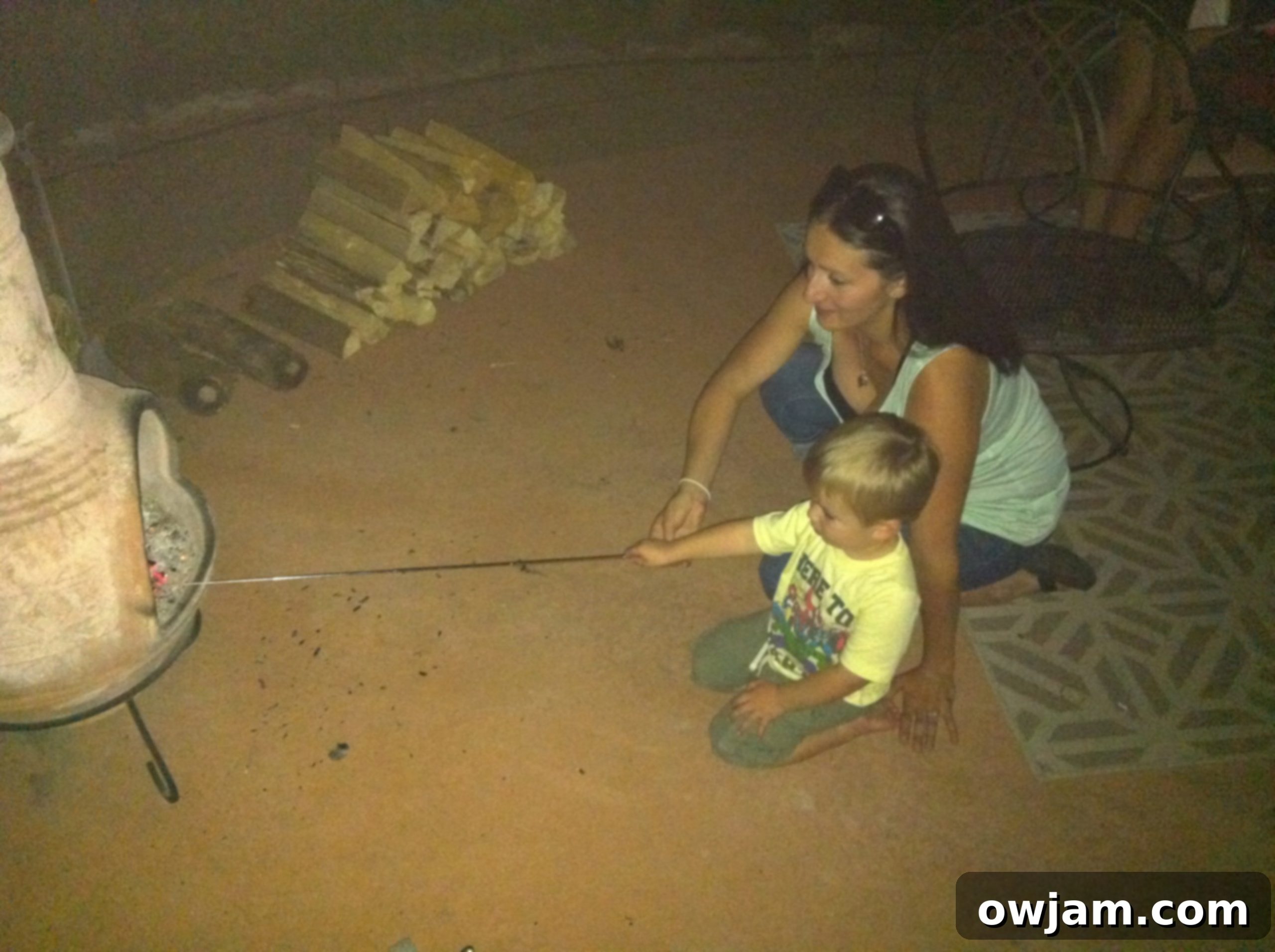 Julia and Will enjoying a campfire