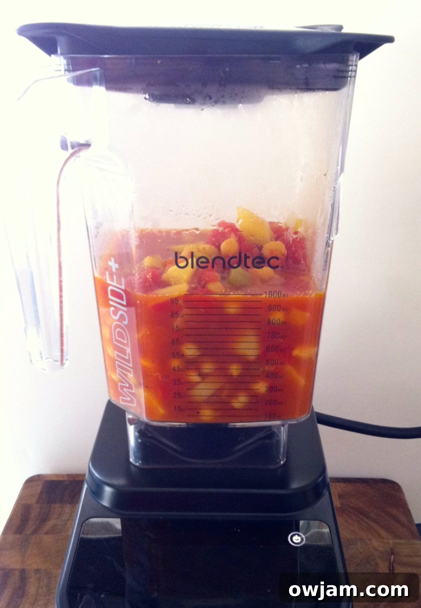 Aromatic Indian Chickpea Vegetable Soup 3 A high-performance blender sitting on a kitchen counter, showcasing its sleek design.