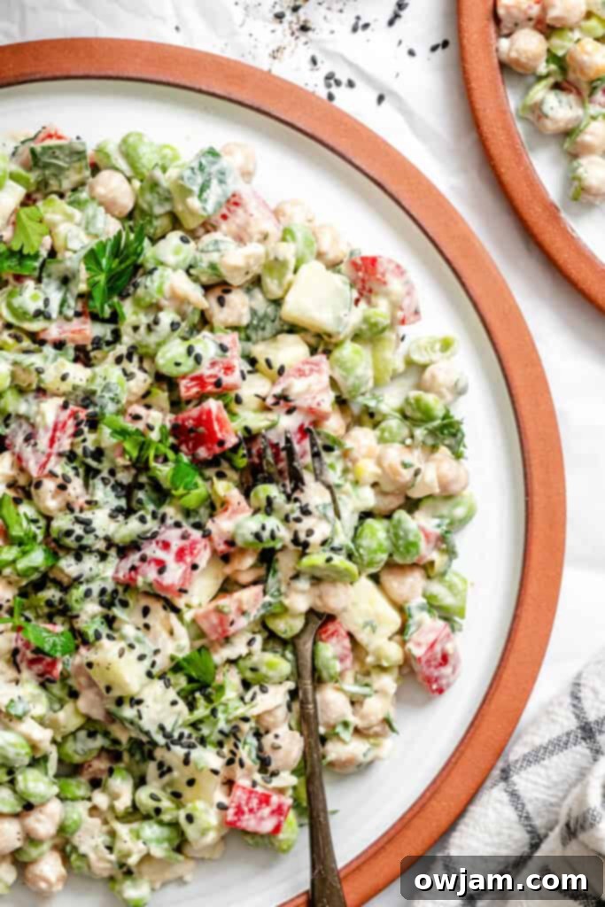 Zesty Edamame Chickpea Feta Bowl 4 Edamame Chickpea Feta Salad on white plate with fork