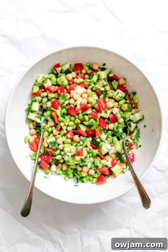 Zesty Edamame Chickpea Feta Bowl 7 Edamame Chickpea Feta Salad mixed in a bowl