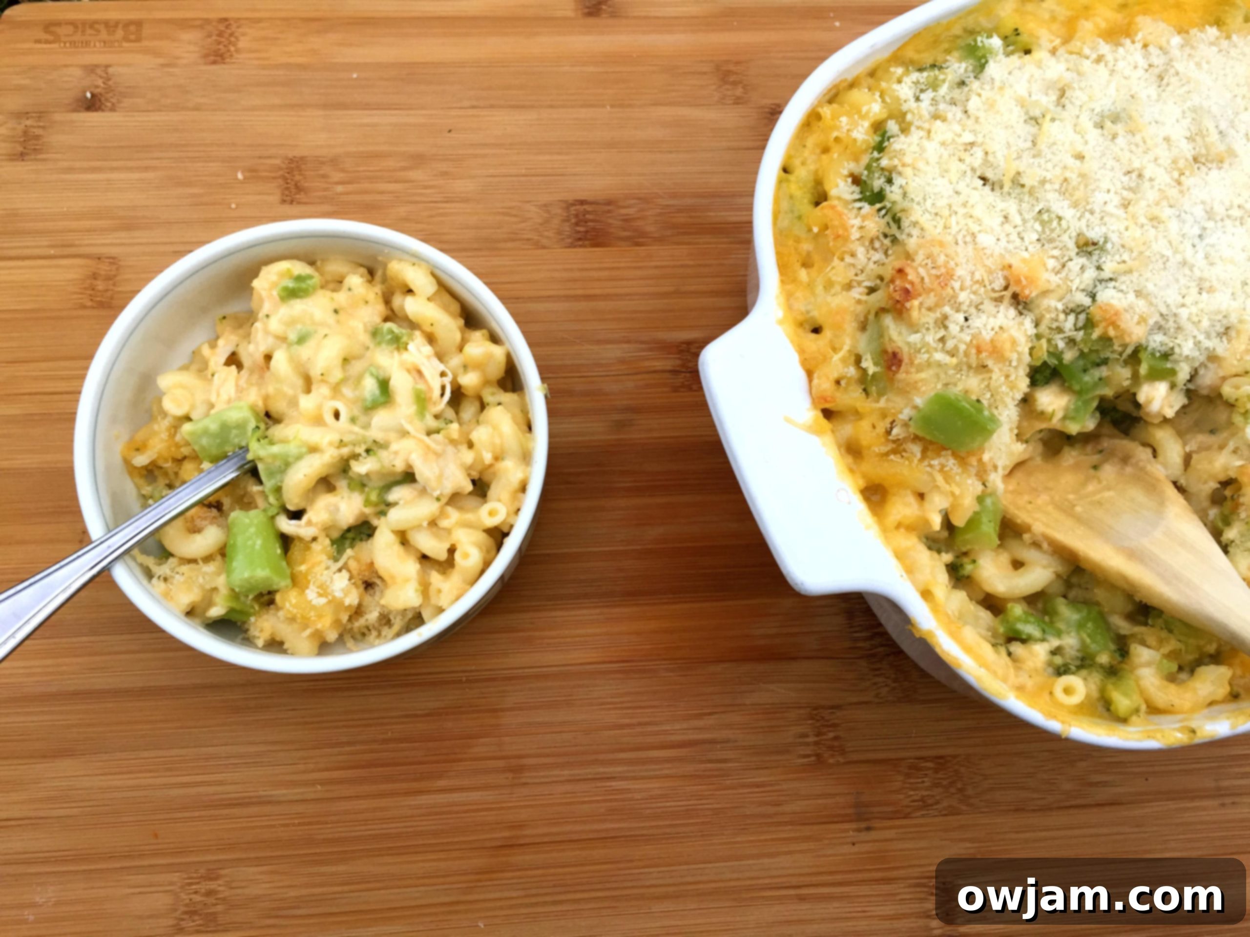 Creamy Chicken Broccoli Macaroni Bake 3 Close-up shot of Chicken Broccoli Mac and Cheese in a baking dish, highlighting the rich cheese sauce and vibrant broccoli.