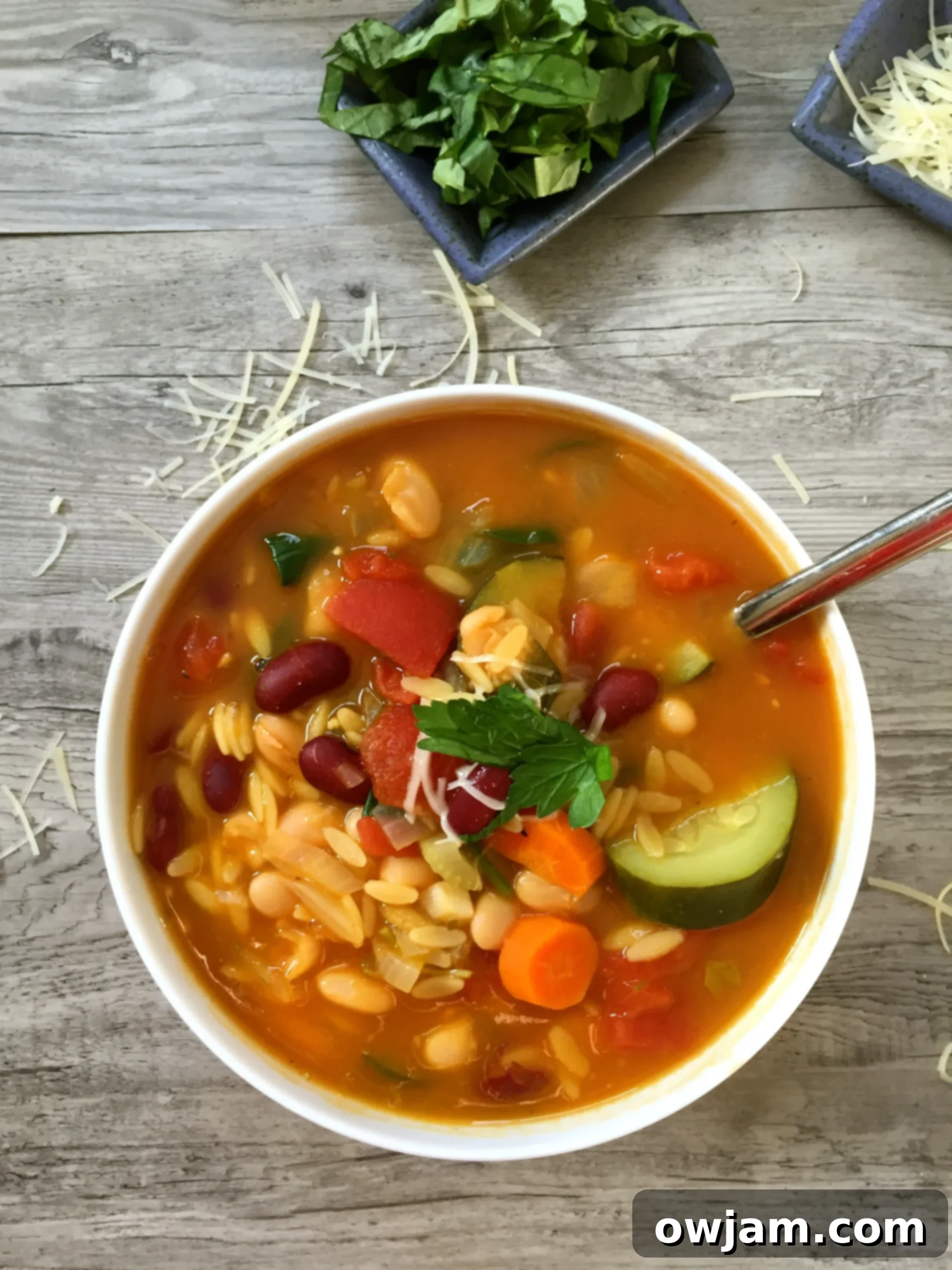 A comforting bowl of 30-Minute Orzo Minestrone Soup, ready to be enjoyed