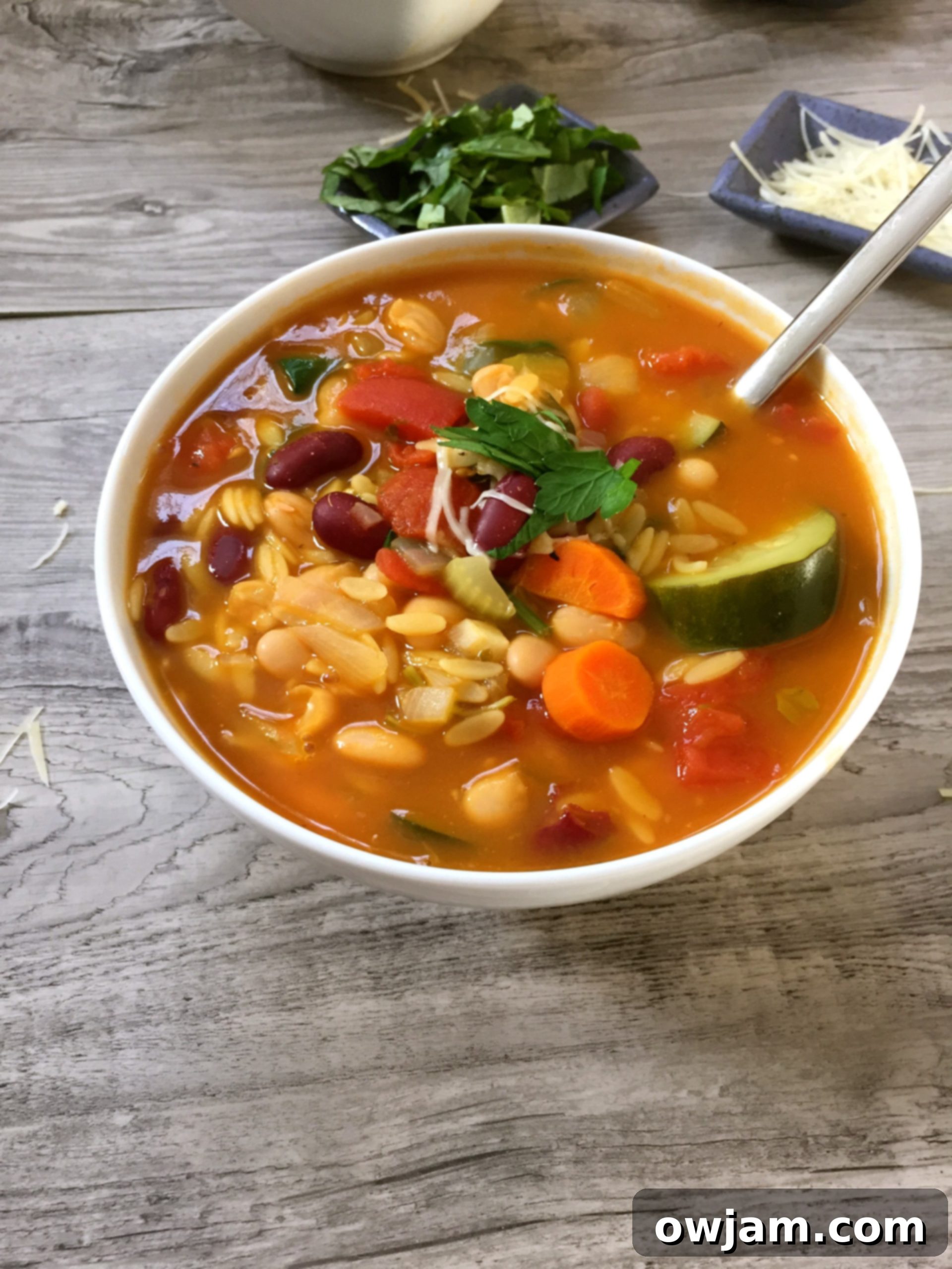 Freshly made Orzo Minestrone Soup, rich with vegetables and small pasta