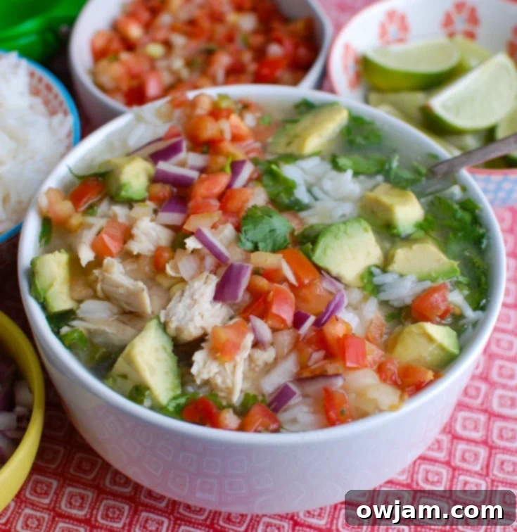 Zesty Slow Cooker Mexican Chicken Lime Soup 5 Forget the soup at the restaurant and make your own Slow Cooker Mexican Chicken Lime Soup. This soup is sweet, spicy and is filled with shredded chicken, corn, avocado, rice and your favorite soup toppings.