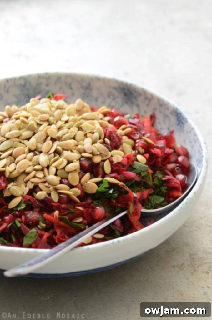 Beet and Carrot Salad with Pomegranate and Pumpkin Seeds