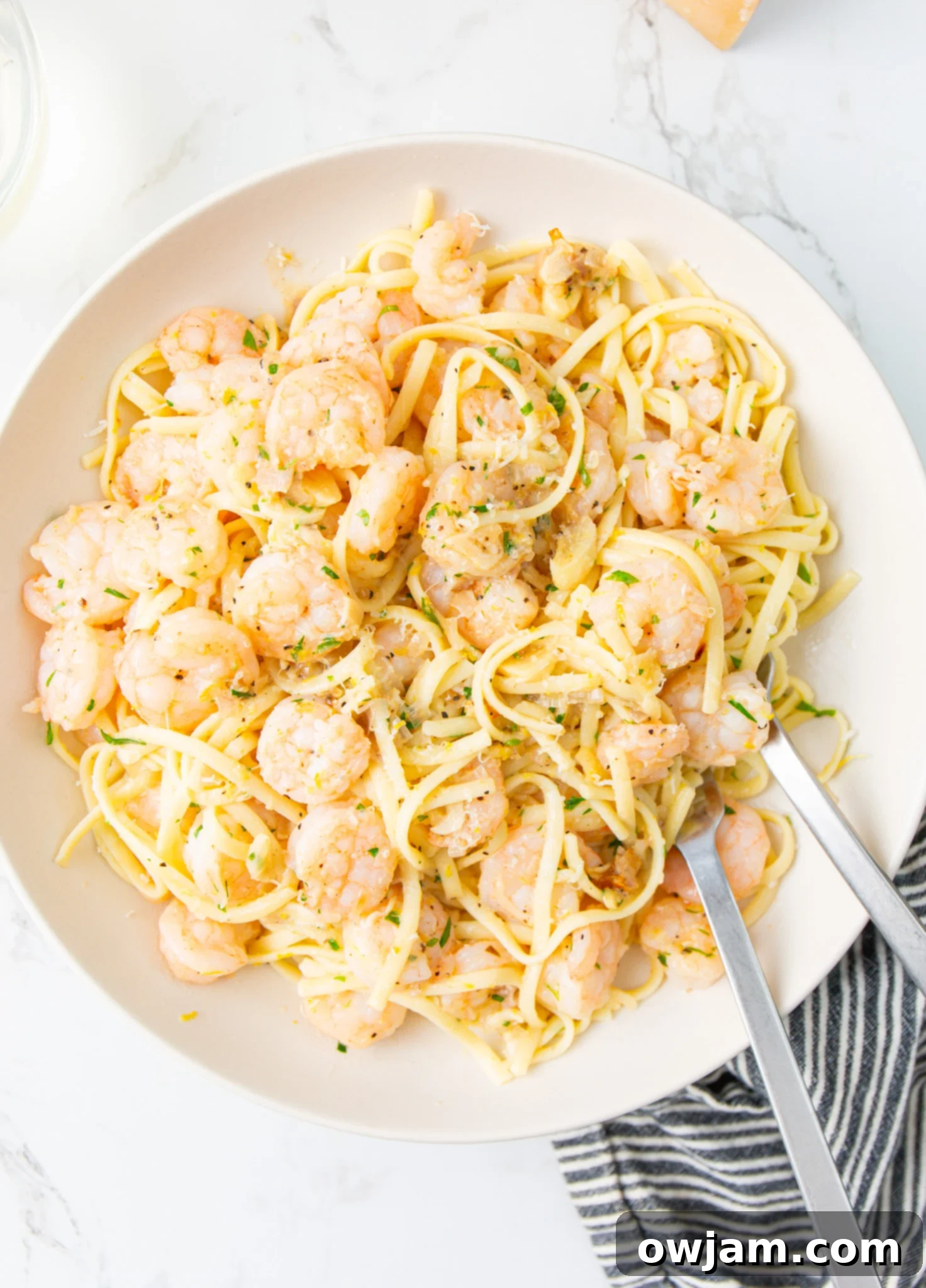 Zesty Lemon Garlic Shrimp Pasta 5 Close-up of Lemon Garlic Shrimp Pasta in a white bowl, ready to be served.