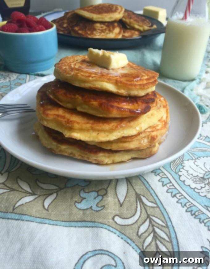 Child pouring ingredients for pancakes