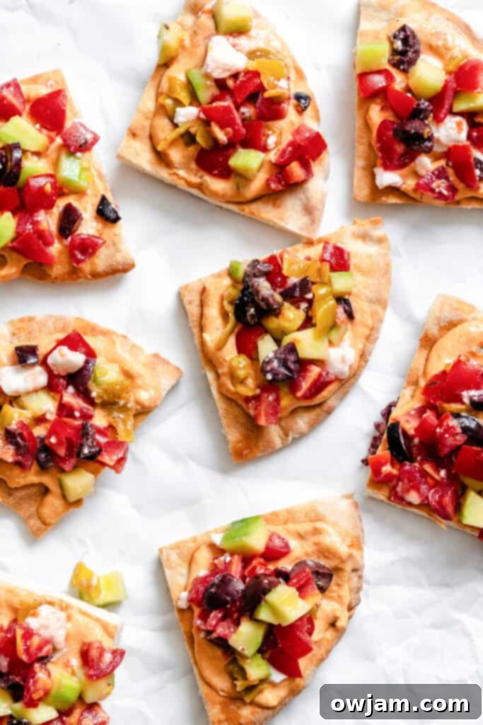 Loaded Hummus Pitas on a platter 
