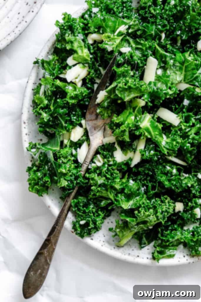 Zesty Lemon Kale Salad 8 Kale Salad with Lemon Dressing with a fork