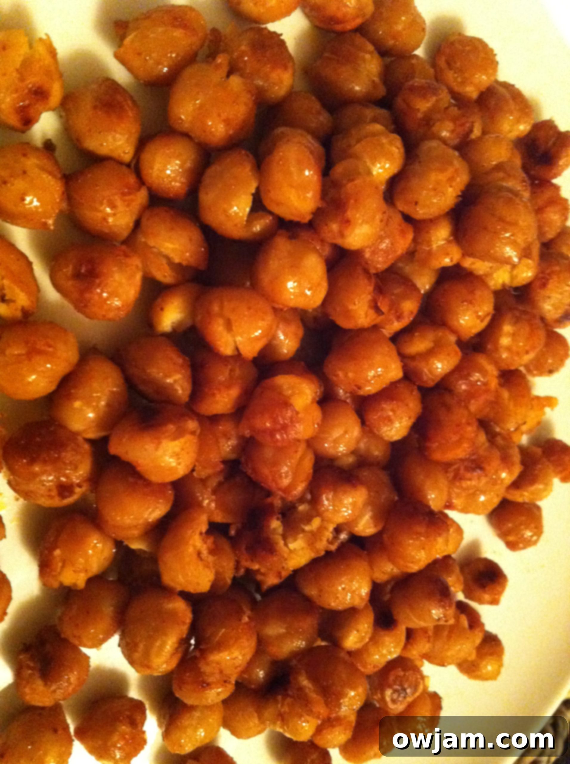 Close-up of roasted chickpeas with visible seasoning.