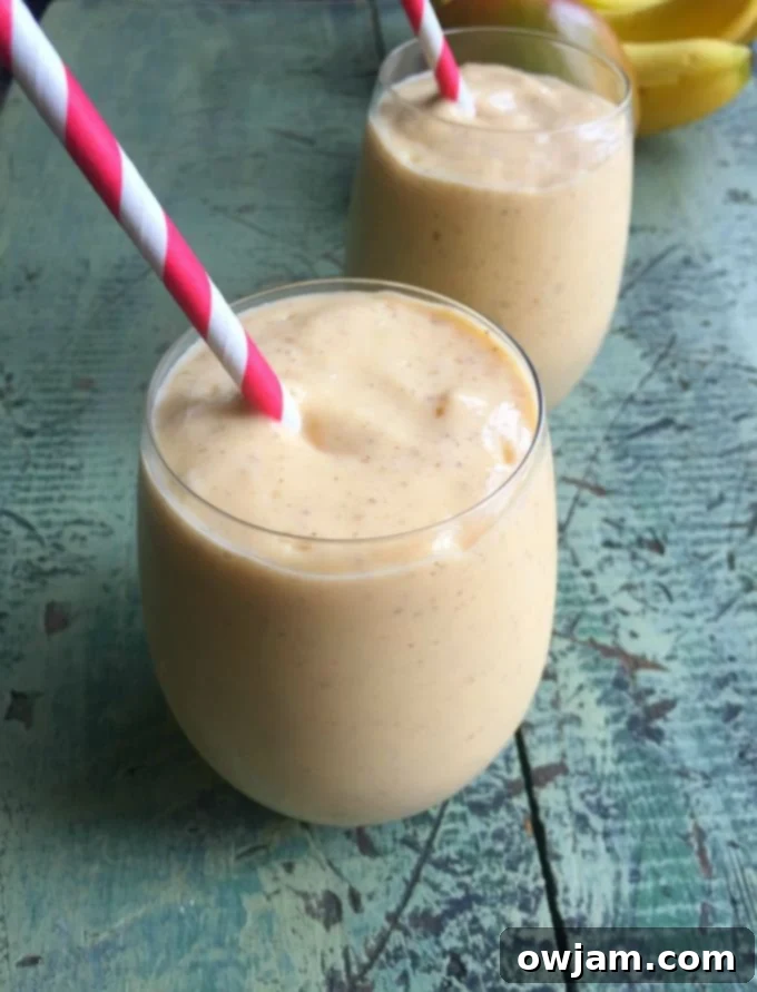 Creamy Tropical Swirl 2 Tropical Yogurt Smoothie with vibrant colors