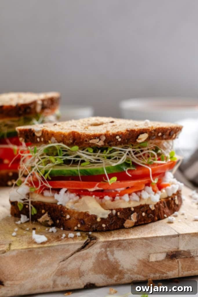 Mediterranean Garden Sandwich 4 Mediterranean Vegetable Sandwich on a cutting board, ready to be served