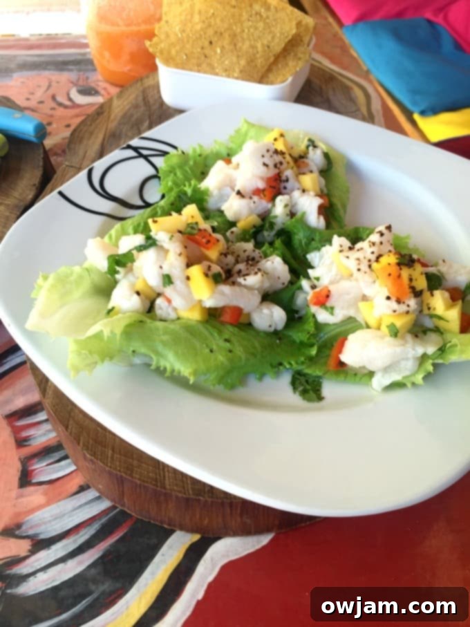 Mango fish lettuce wraps with fresh ingredients