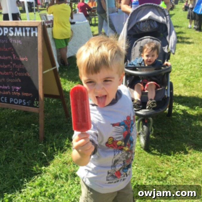Delicious homemade strawberry rhubarb popsicle, a refreshing summer treat.