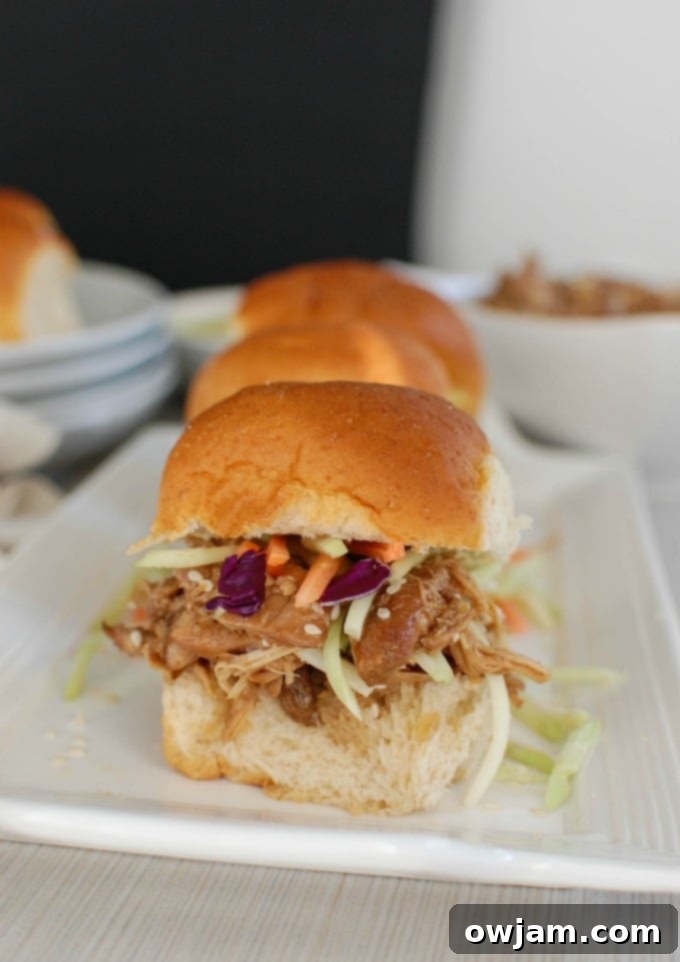 Sticky Honey Sesame Slow Cooker Chicken Sliders 2 Slow Cooker Asian Honey Sesame Chicken Sliders - yum