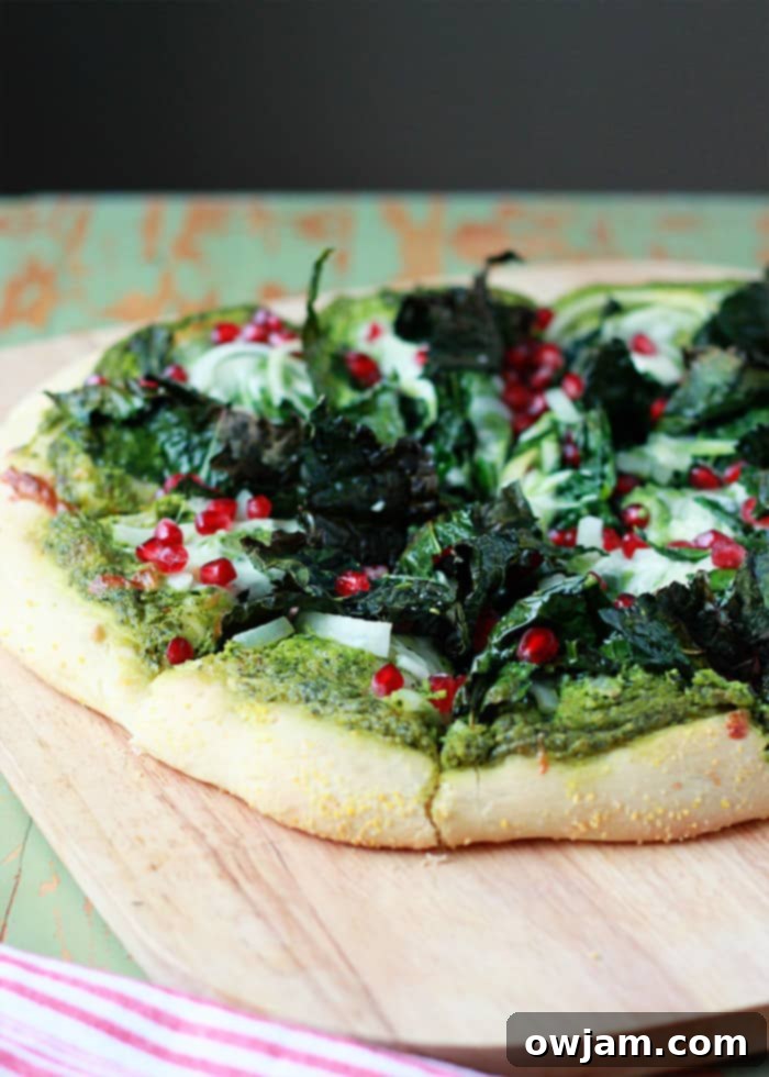 Kale & Pomegranate Pizza with Creamy Pesto Sauce