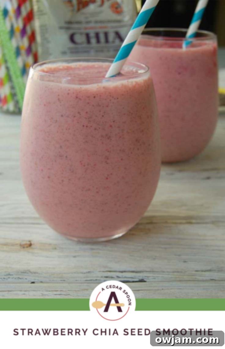 Strawberry Banana Chia Delight 5 Strawberry Banana Chia Smoothie in a branded glass, emphasizing the fresh ingredients and healthy lifestyle.