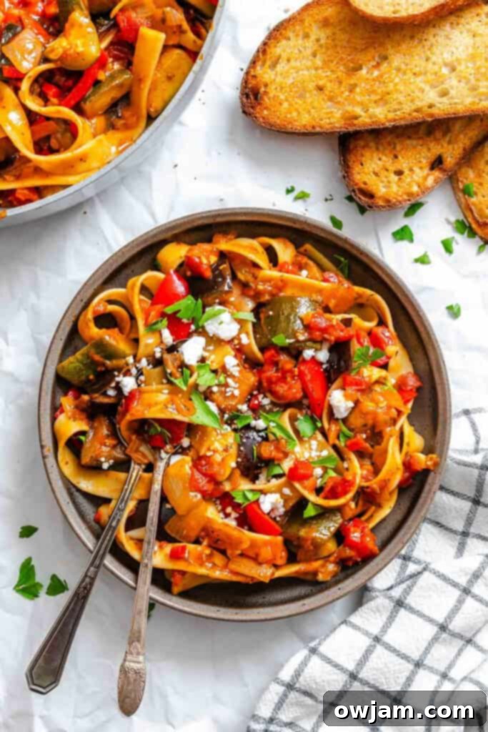 A serving of Ratatouille Pappardelle in a rustic bowl, ready to be enjoyed.