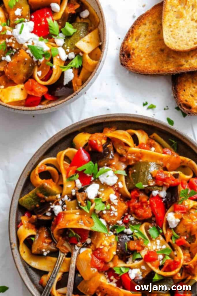 A beautifully plated bowl of Ratatouille Pappardelle, garnished and ready to serve.