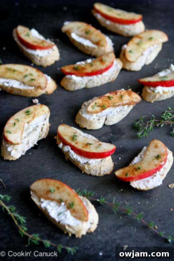 Elegant Cinnamon Apple and Goat Cheese Crostini, a sweet and savory appetizer with crispy baguette, creamy cheese, and spiced apple slices