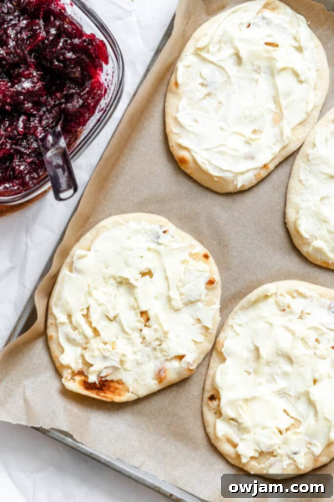 Warm Brie Cranberry Naan Bread with brie on naan
