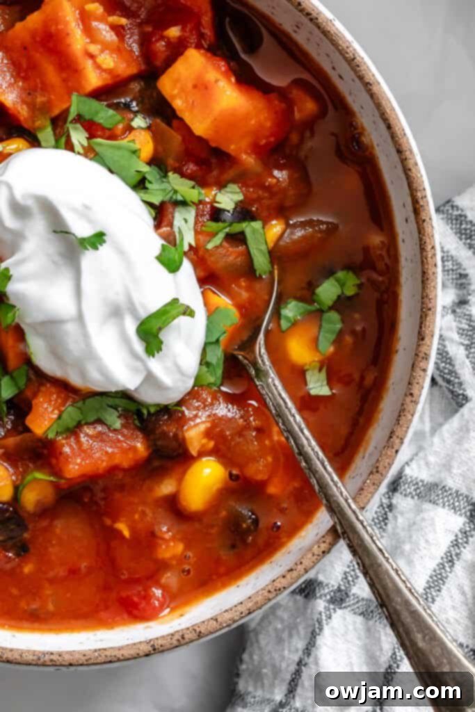 Sweet Potato Chili in a bowl with a spoon