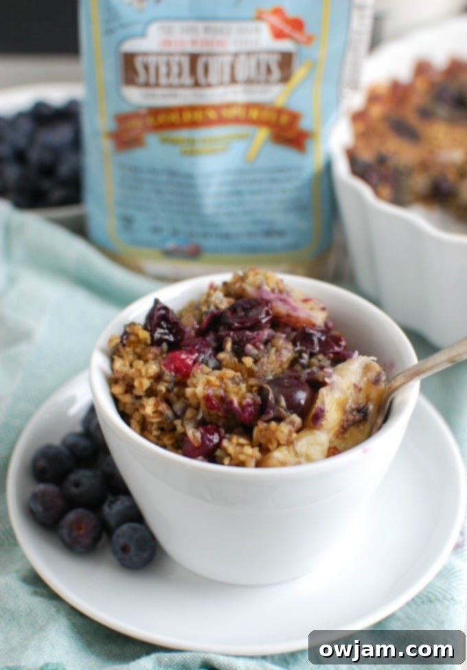Baked Blueberry Banana Steel Cut Oatmeal in a baking dish, fresh from the oven, ready for a healthy breakfast