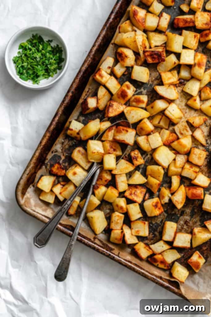 Lemon Cilantro Roasted Potatoes on baking sheet with cilantro  