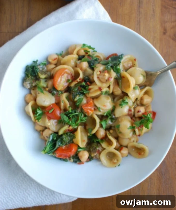 One-Pot Wonder Chickpea Kale Pasta 4 One Pot Chickpea Kale Pasta Recipe in bowl.