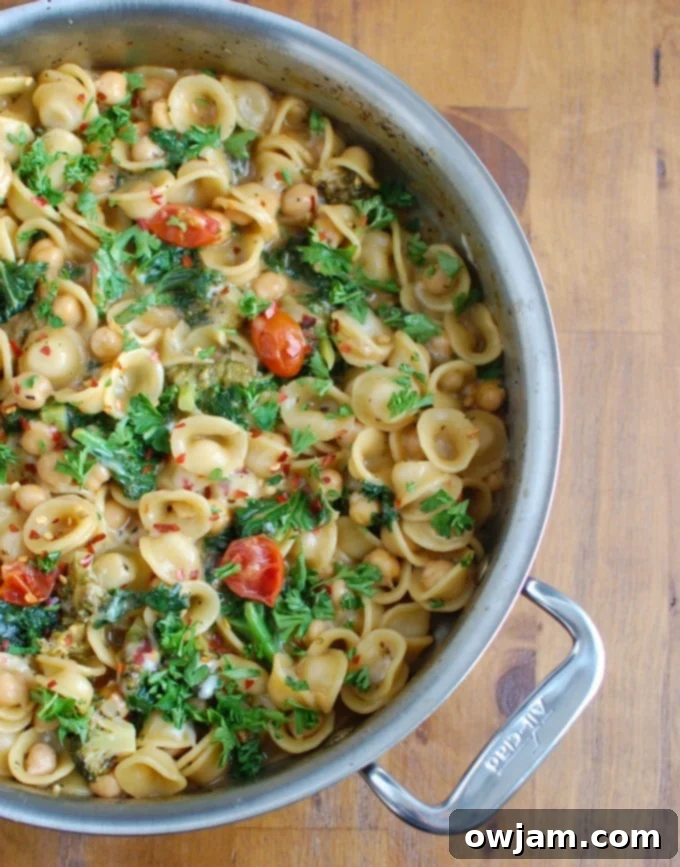 One-Pot Wonder Chickpea Kale Pasta 5 One Pot Chickpea Kale Pasta Recipe with tomatoes.