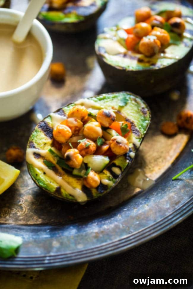 Grilled Avocado Stuffed with Chickpeas and Tahini