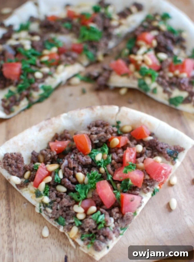 Spiced Beef Hummus Pita Pizza 3 Spiced Beef and Hummus Pita Pizza sliced