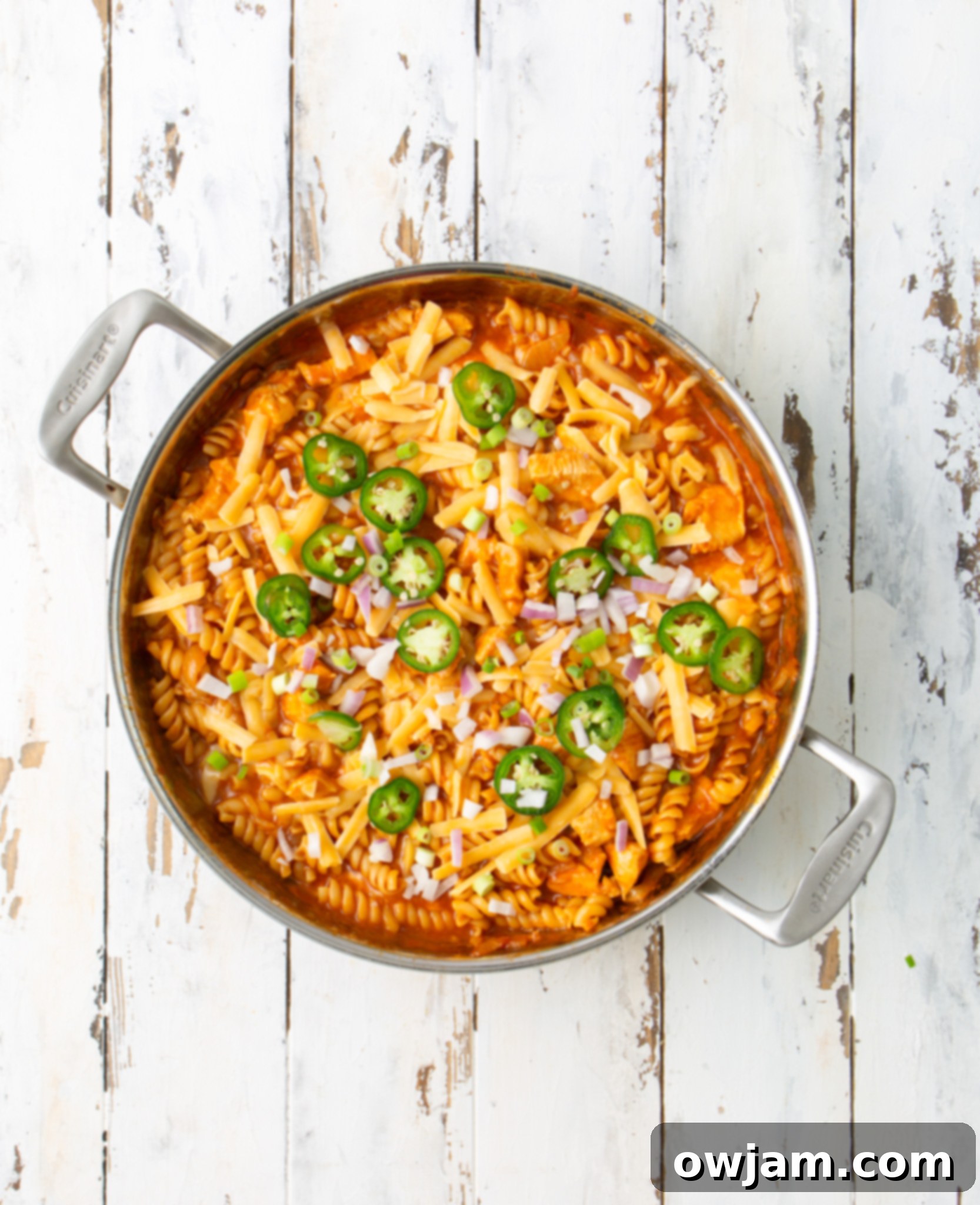 Creamy One-Pot Chicken Enchilada Pasta 7 One Pot Chicken Enchilada Pasta in a silver pot